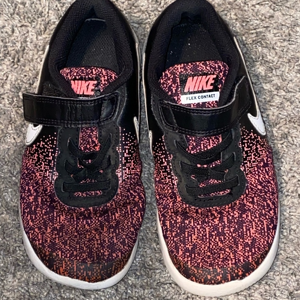Pink and black toddler girls Nike tennis shoes